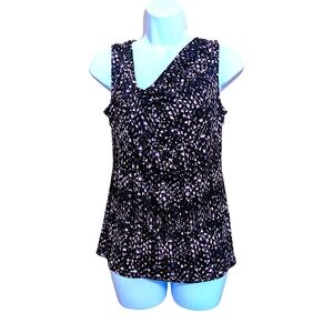 Ivanka Trump asymmetrical sleeveless blouse